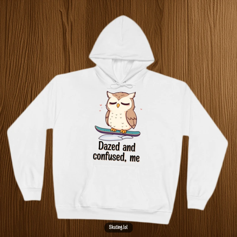 Funny hoodie depicting a cute, dazed owl resting on a snowboard, offering warmth and a dose of sleepy charm.