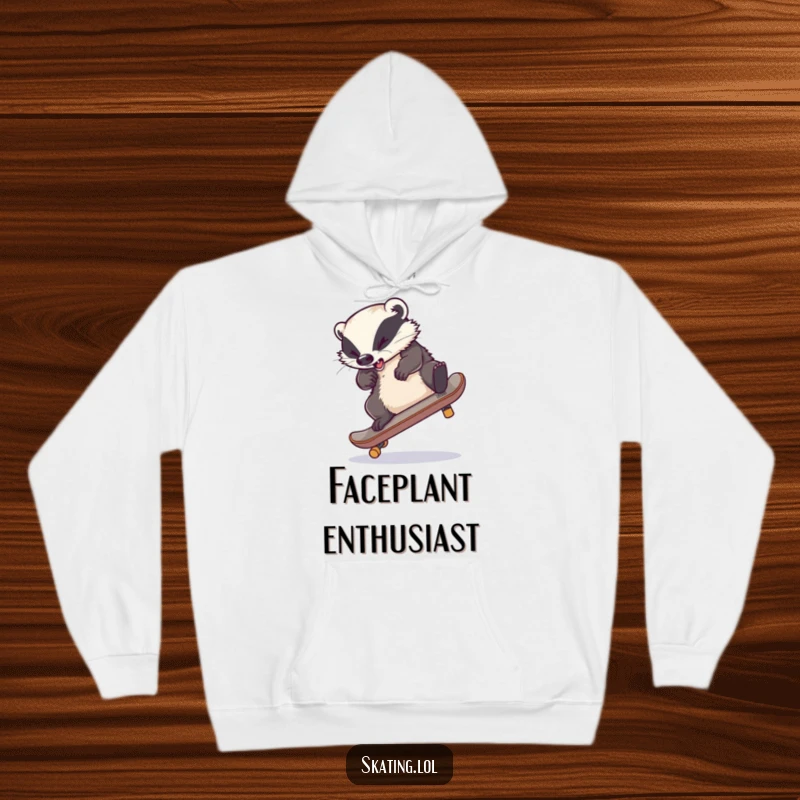 Funny hoodie depicting a clumsy badger hilariously failing a skateboard flip, with legs comically tangled, radiating joy.