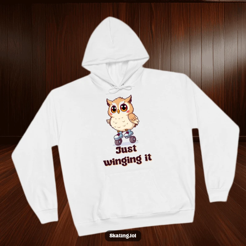 Funny hoodie featuring a surprised owl wobbling unsteadily on tiny roller skates, offering quirky comfort and humor.